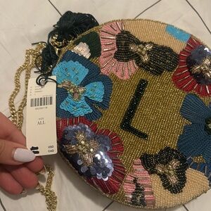 Gold initial bag L Anthropologie with tags